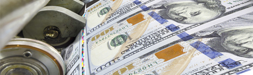 Close up of dollar banknotes being printed