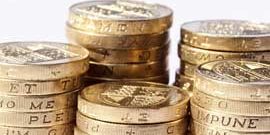 Photo of a stack of pound coins.