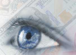 Counterfeit_fake_banknote_warning Counterfeit banknotes being visually checked.