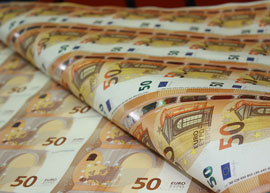 Europa-series-banknotes-manufacture-production Sheets of new 50 euro banknotes waiting to be cut.