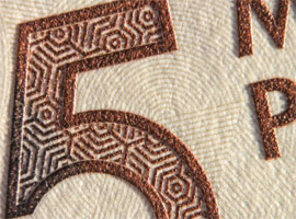 Colombia_5000_2016_intaglio Close up image of intaglio ink depicting the number 5 denomination.