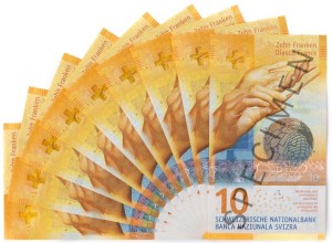 Image of a fan of new ten franc banknotes.